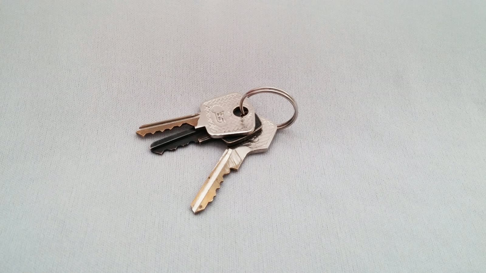 House keys on a counter representing first-time buyer cash planning in San Antonio